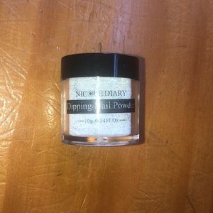 Dipping nail powder or acrylic powder.